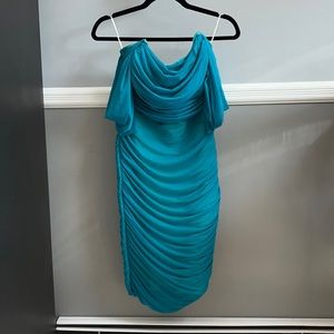 NEVER WORN:  Elegant dress from Fashion Nova. Blue/turquoise color. Size: S